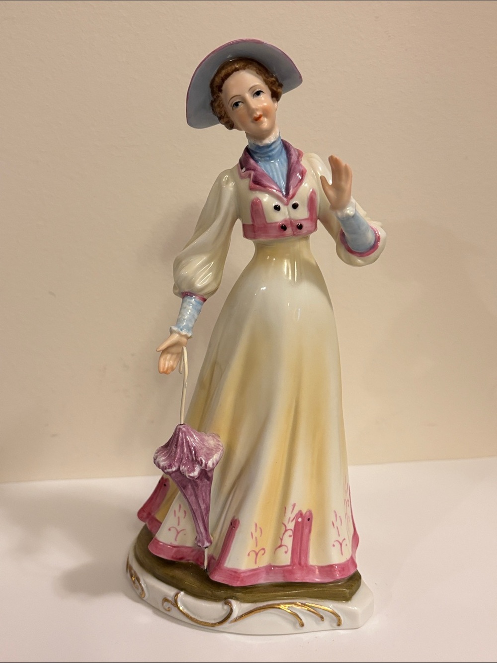 Vintage hand-painted Kowa porcelain lady figurine
